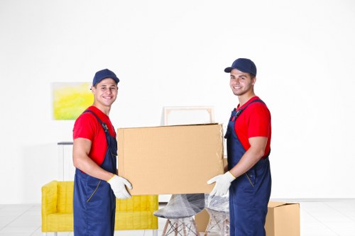 Household furniture being loaded carefully by local removalists