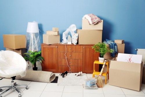 Professional movers navigating a Kennington property access route
