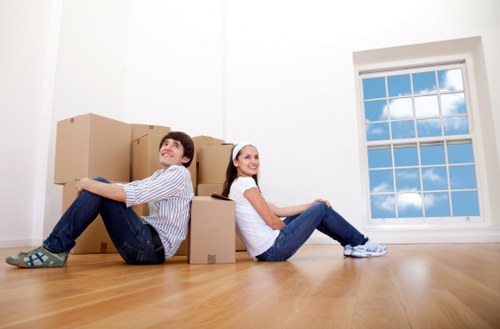 Packed boxes and furniture ready for storage in a Kennington property