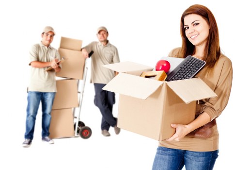 Careful loading of sofas and tables for local transport