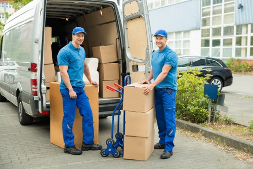 Removal team loading boxed items for a local Kennington move